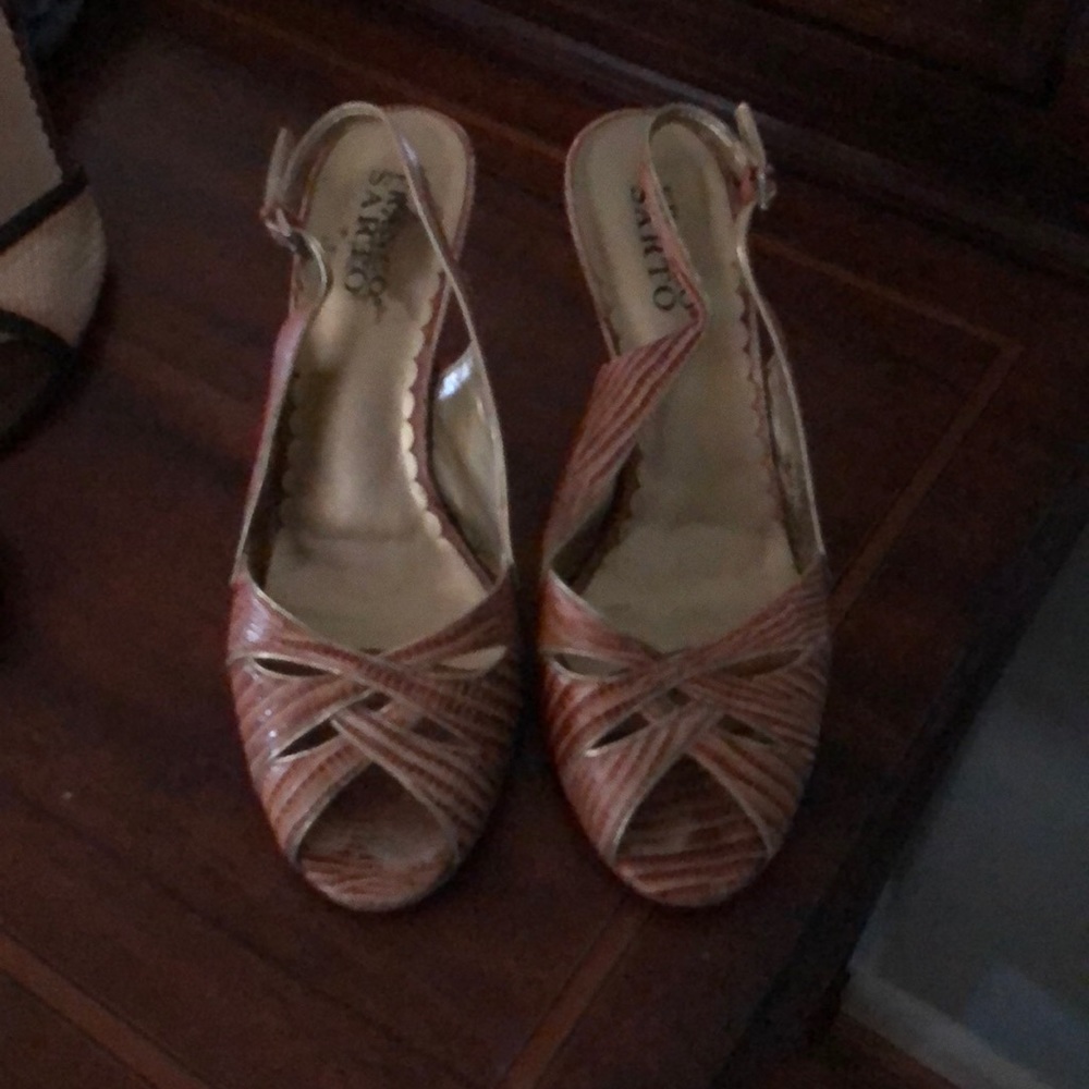 Great pair open toe, sling back heels.